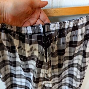 "Black and white plaid pants, size 12. Brand unknown.